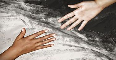 a multiracial picture of hands depicting a war on racism.